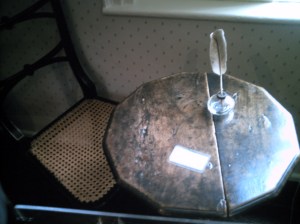 The writing table she wrote her stories on.  When we were looking at it, Amy just said in a voice that had us all laughing, "This is where it happened..."