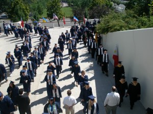 A long line of grads, in which I was grateful to find a couple of friends