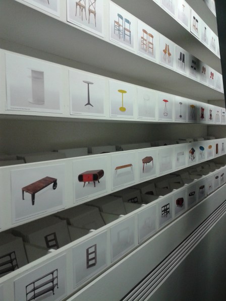 The best design in the design showroom? Shelves and shelves containing individual description cards for each of the items sold.